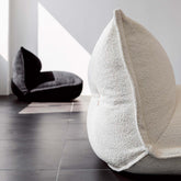White alpaca boucle caterpillar single sofa lounge chair with floor-standing design